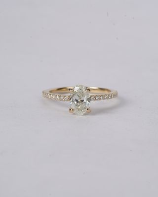 1.22 Total Carats with 1.00 Carat Center Oval Diamond Engagement Ring in 14k Yellow Gold