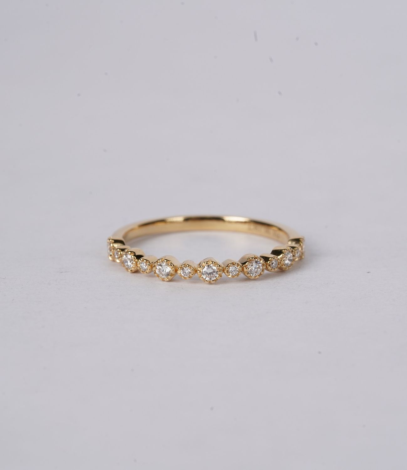 NBE- 18KY 1.61g .18ctw Diamond Bezel Milgrain Stackable Band (size 6.5)