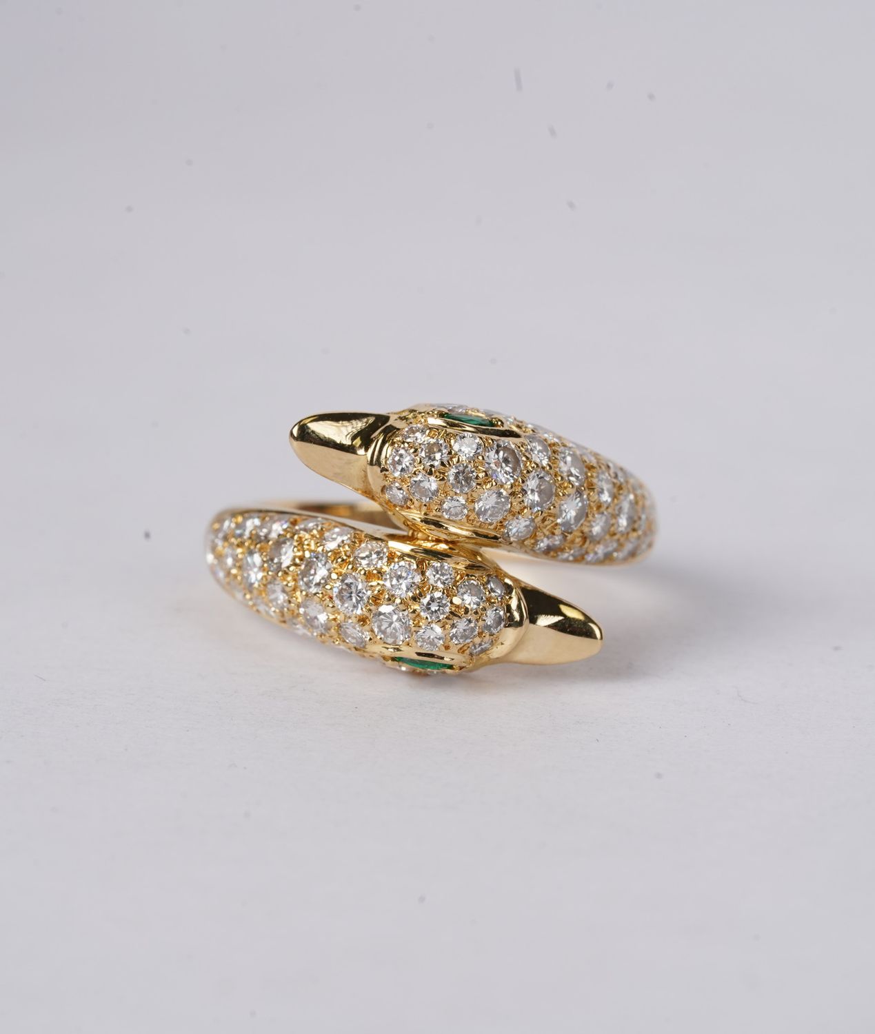 BETX- 18KY 6.30g 1.50ctw Diamond &amp; Emerald Piaget Swan Crossover Fashion Ring (size 6.25)