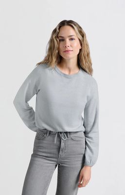 Sweater with cord at bottom