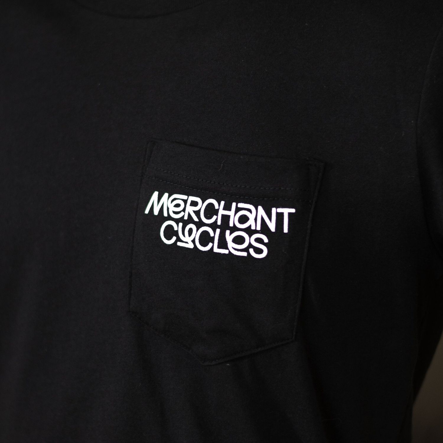 2025 Merchant Cycles Black Pocket Tee