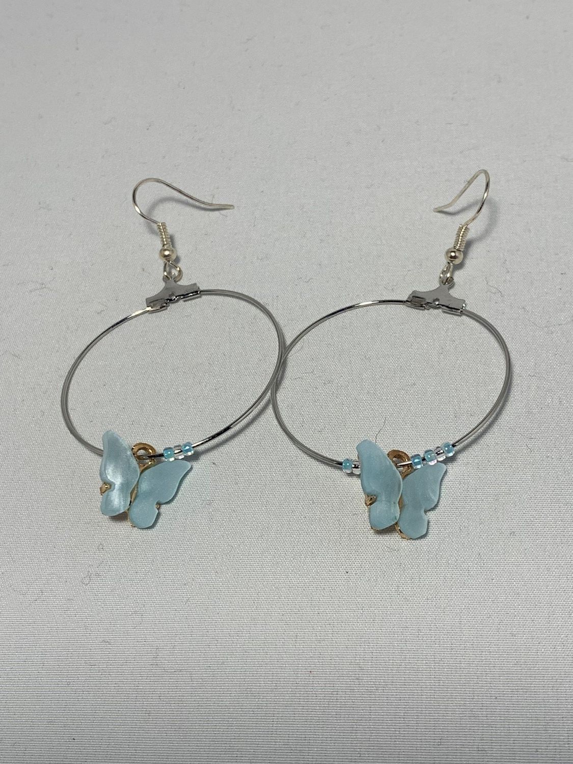 Silver Hoops with Light Blue Butterflies