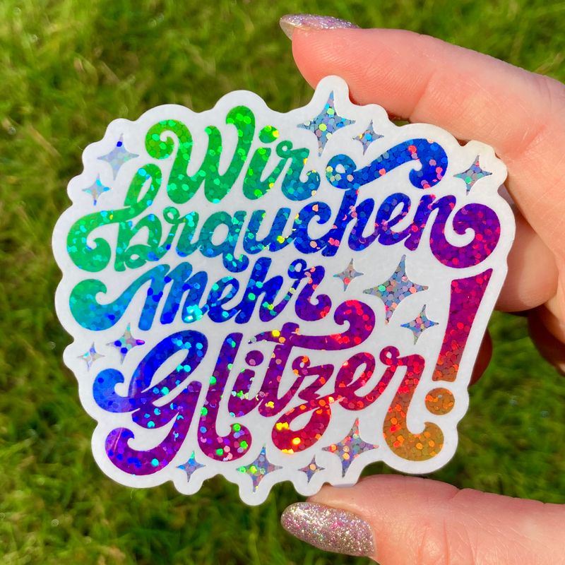 Glitzer-Sticker hell "Wir brauchen mehr Glitzer"