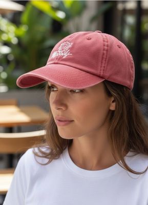 Woman wearing Mooody baseball cap