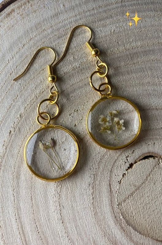 Pendientes de plantas encapsuladas