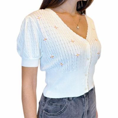Cardigan bianco con fiori