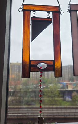 Guillotine Suncatcher (Brown)