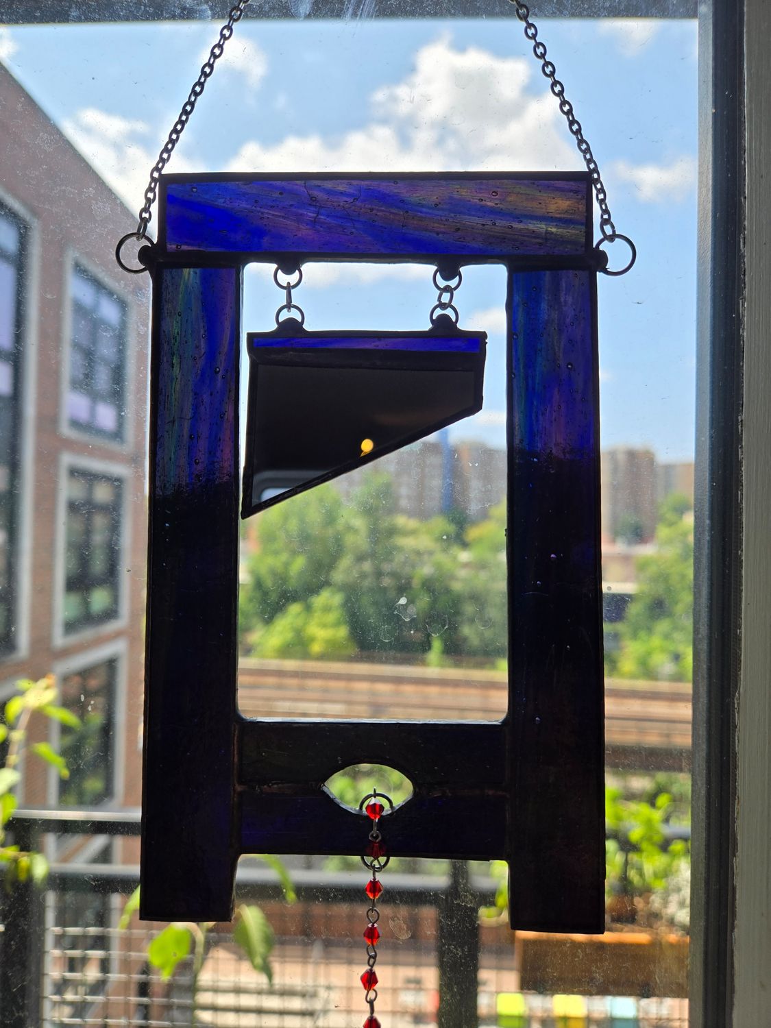 Guillotine Suncatcher (Dark Blue)