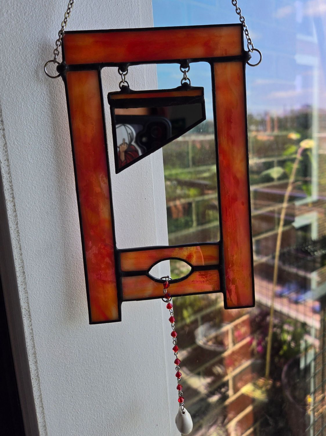 Guillotine Suncatcher (Iridized Orange)