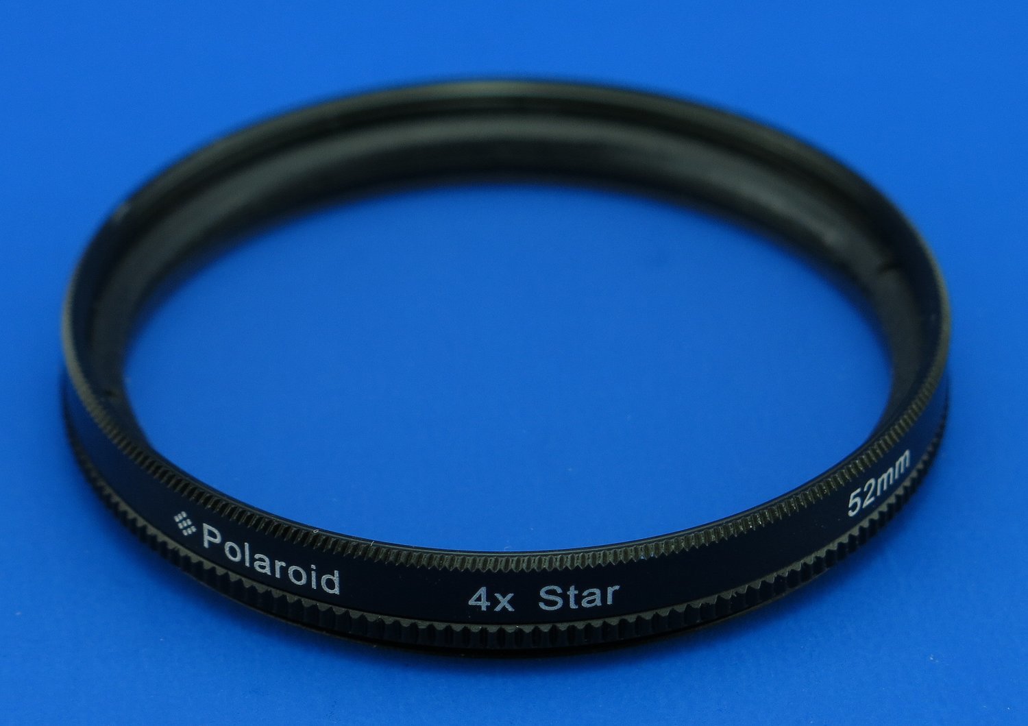 Polaroid Optics 52mm Lens Filter -  Revolving 4 Point Star