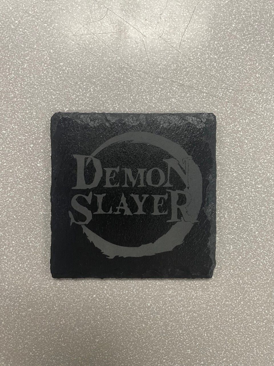 Coaster Demon Slayer Logo
