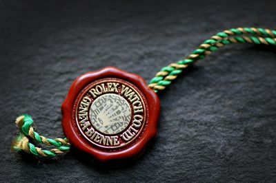 Rolex Red Hang Tag