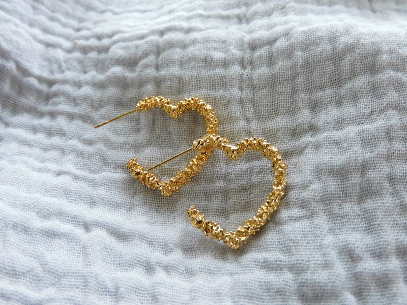 Cupid oorbellen - goud