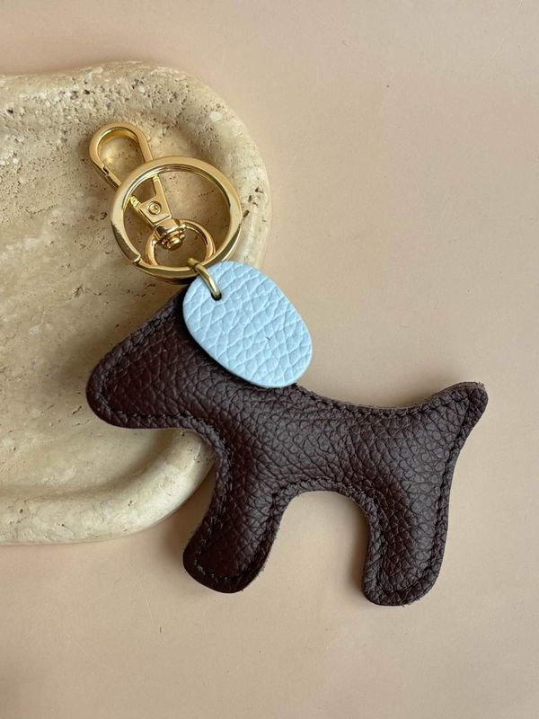 Hondje bag charm - bruin &amp; lichtblauw