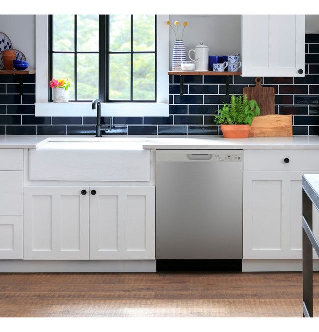 GE Front Control with Plastic Interior Dishwasher with Sanitize Cycle &amp; Dry Boost GDF550PSRSS