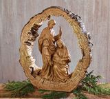 Carved Holy Family in Hollow Log