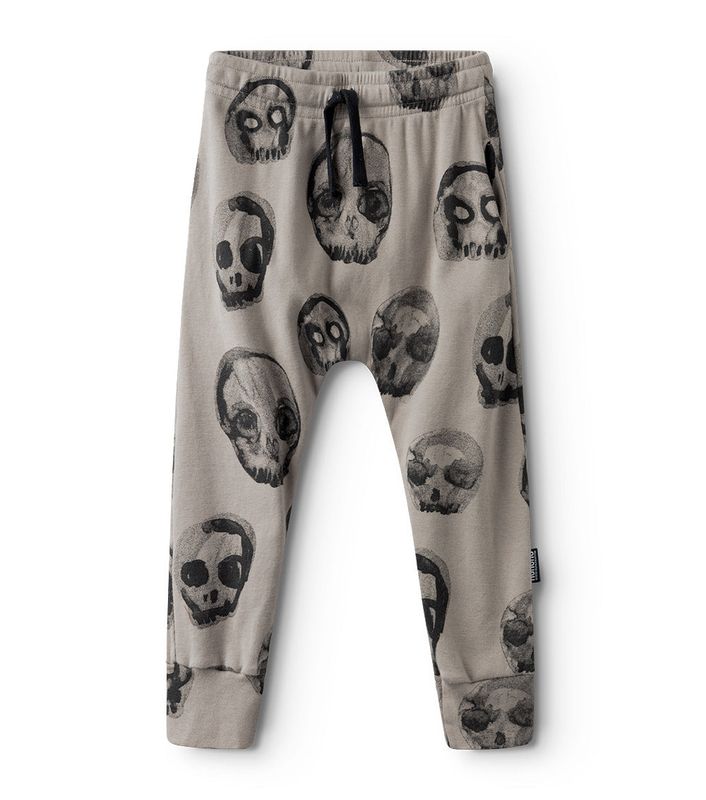 NUNUNU Light Faded Skulls Baggy Pants