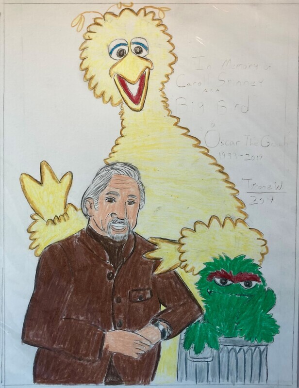 In Memory of Caroll Spinney depicts puppeteer Caroll Spinney surround by his most famous puppets, Big Bird and Oscar the Grouch. Big Bird, a large yellow bird, stands behind Spinney and Oscar with his left hand on Spinney&#39;s shoulder and his right hand waving. Spinney sits on the left of the page wearing a brown suit and watch. His hands are folded on his lap. Spinney has grey hair and a beard. To the right is Oscar, a green muppet with a large brown unibrow. Oscar has his right hand in front of him with his left hand on his cheek. To the right of the piece are the words, &quot;In Memory of Caroll Spinney- Big Bird- Oscar the Grouch 1933-2019.&quot; The piece is signed Tyrone W. 2019.