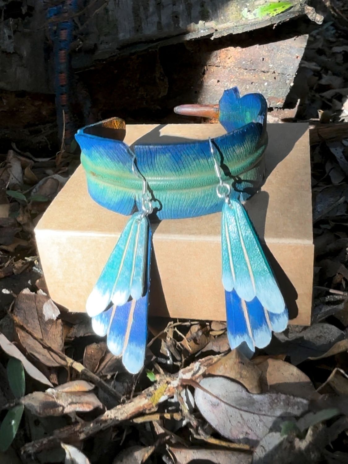 &#39;Tūī Whisper&#39; Leather Feather Wristband &amp; Earrings Set