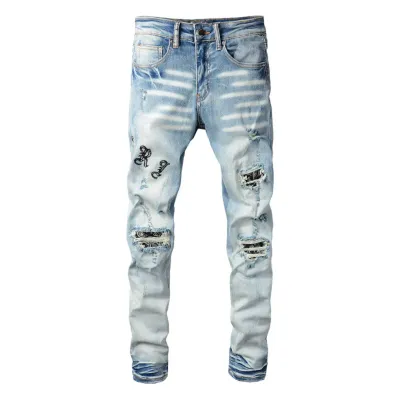 AMIRI BLUE DISTRESSED JEANS