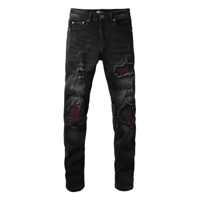 AMIRI BLACK RIPPED JEANS