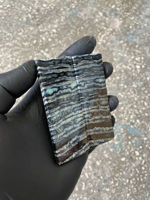 Woolly mammoth tooth scales close up natural pattern fossil knife material