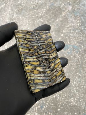Woolly mammoth tooth scales close up natural pattern fossil knife material