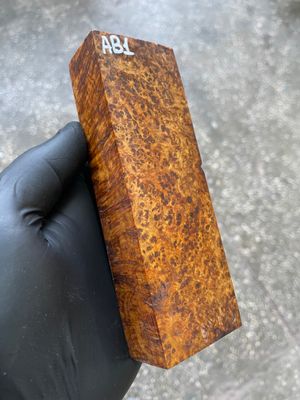Stabilized Amboyna burl cap for custom knife handle