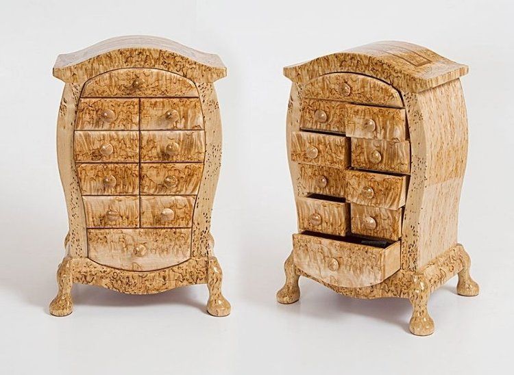 Karelian birch wood cabinet with drawers and distinctive figured grain