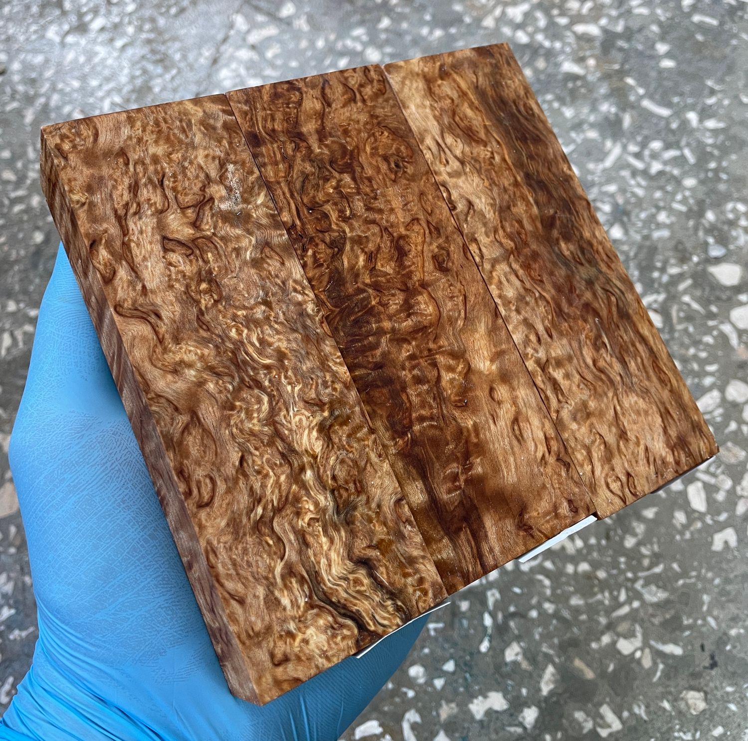 Stabilized Karelian birch wood blocks with highly figured grain and enhanced natural texture