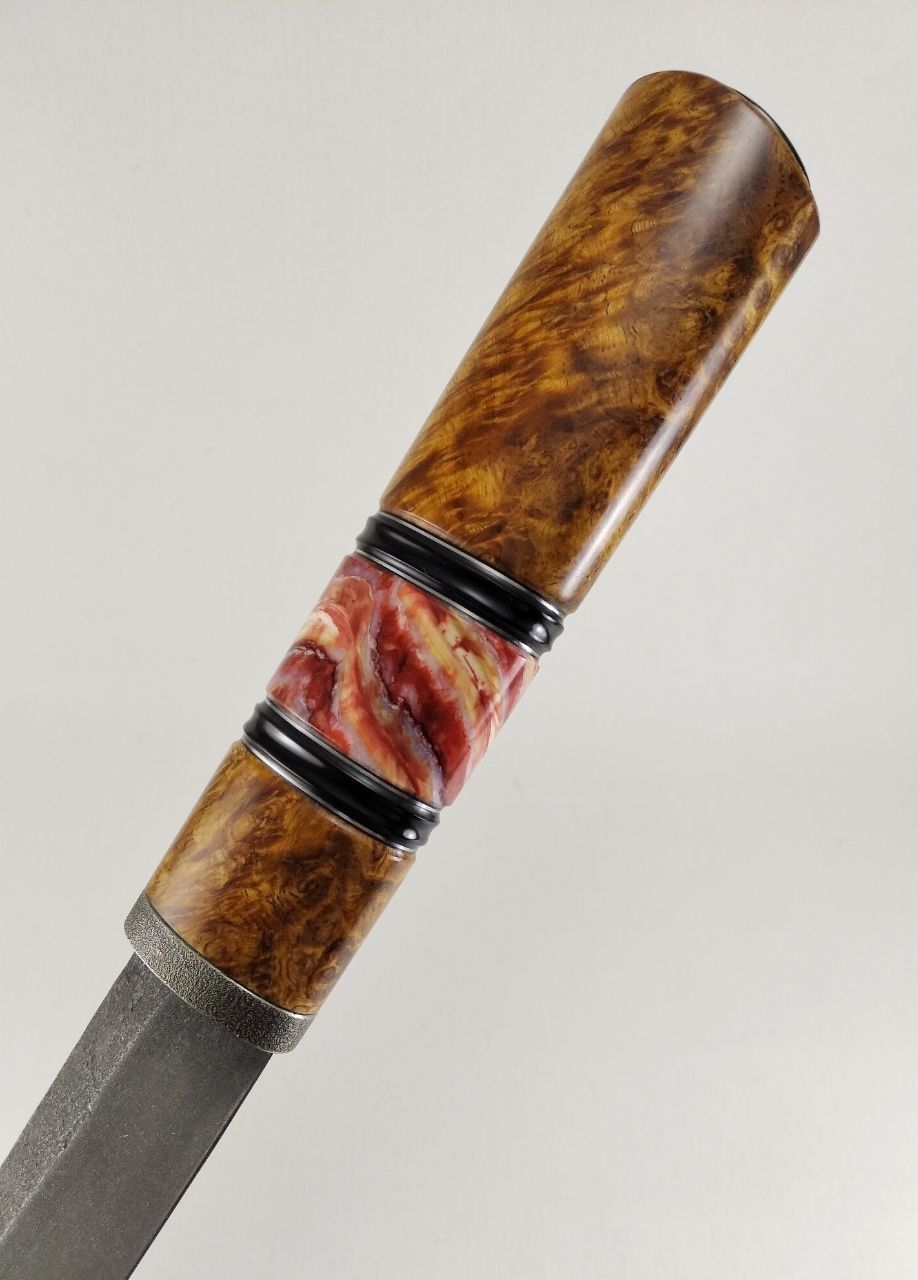 Handmade knife with a natural Amboyna burl handle featuring unique eyes, curls, and contrasting wood grain.