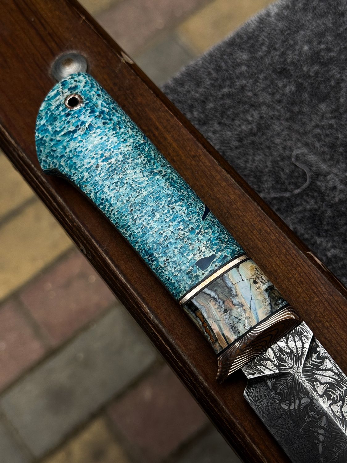 stabilized whale vertebra on knifehandle.