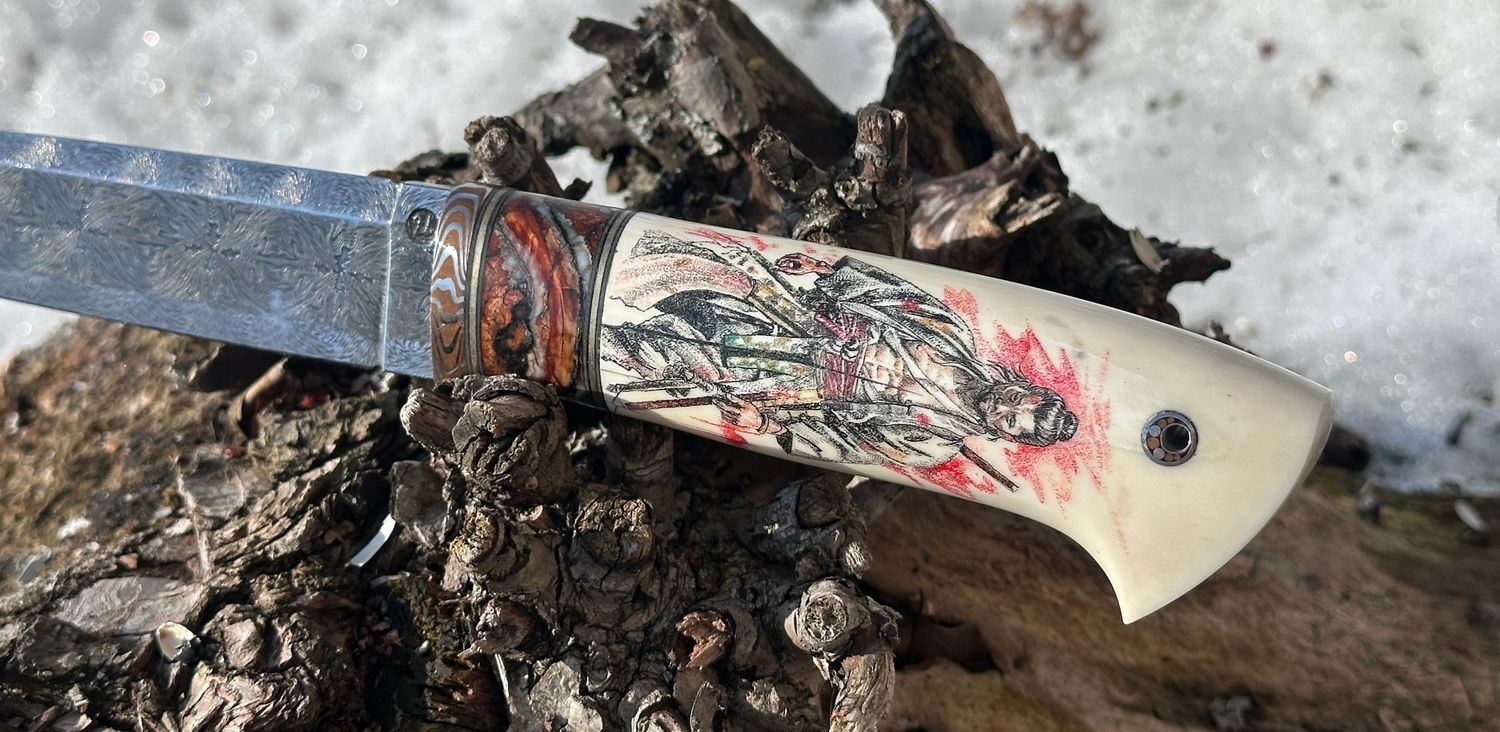 scrimshaw on walrus knife handle