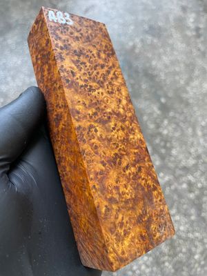 Stabilized Amboyna burl cap for custom knife handle