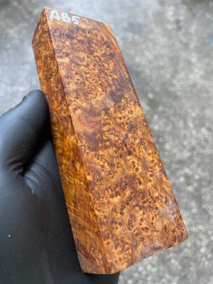 Stabilized Amboyna burl cap for custom knife handle