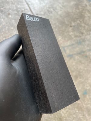 Matched pair of stabilized bog oak knife scales with natural prehistoric wood figure, ready for custom knife projects.