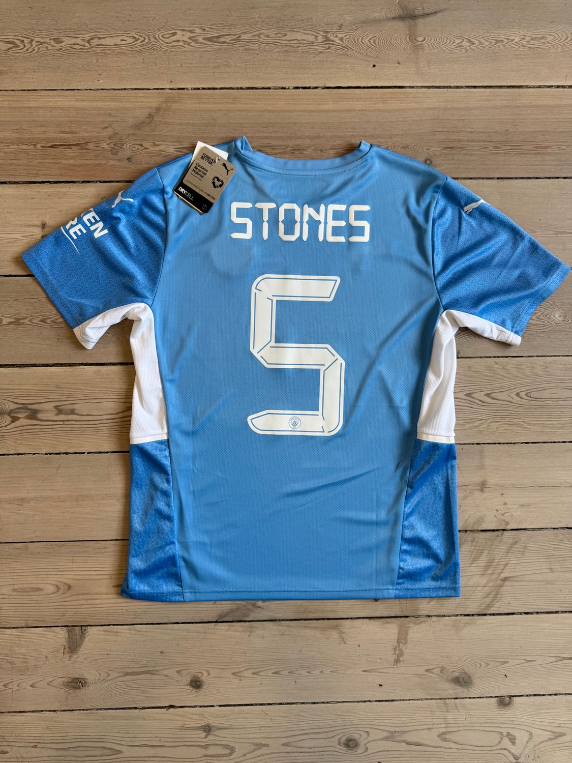 ​John Stones - Manchester city Hjemmebane 2021/22 - Large