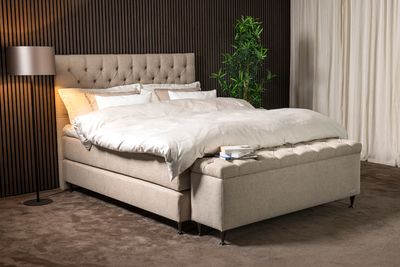 Bellus continental bed Dream, two tier spring mattresses, choice of spring mattress firmness, choice of bed leg diaina and height, choice of bed headboards, wide choice of fabrics. Sizes: 120 x 200 cm, 140 x 200 cm, 160 x 200 cm, 180 x 200 cm.  Furniture store in Jelgava, Manx Mēbeles, Pulkveža iela Brieža iela 4