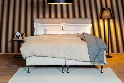 Bellus bed SingleS20 Dual with turnable mattress. 5-zone spring mattress: soft/medium firm, firm/medium firm, firm/extra firm. Bellus top mattresses. Bellus headboards: Relax, Zen, Windsor, Edge. Wooden legs or metal legs - choice of legs, different bed heights. Wide choice of fabrics. Sizes: 80 x 200, 90 x 200, 105 x 200, 120 x 200, 140 x 200, 160 x 200, 180 x 200, 80 x 210, 90 x 210, 105 x 210, 120 x 210, 140 x 210, 160 x 210, 180 x 210 cm.  Bellus beds and sofas. Furniture store in Jelgava, Manx Mēbeles, Pulkveža Brieža iela 4