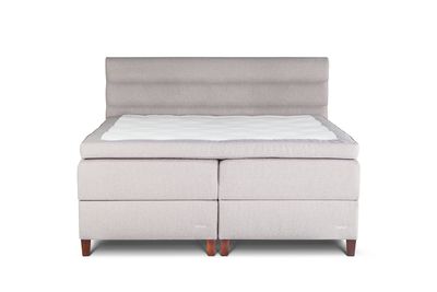Compact Bliss Bellus continental bed with side-folding linen chests. Choice of mattress firmness, choice of top mattress, choice of headboard, choice of footboard, choice of fabrics. 5-zone pocket spring system. Bellus beds. Upholstered beds. High beds. Single beds, double beds. Beds with laundry box. Furniture store Manx Mēbeles, Jelgava, Pulkveža iela Brieža iela 4