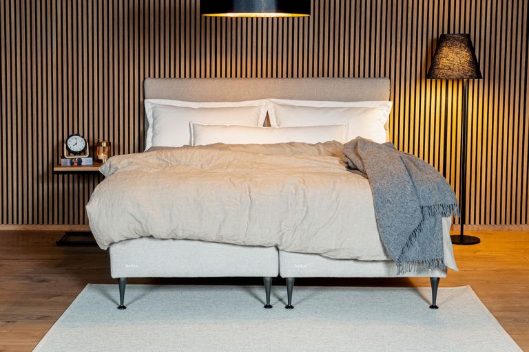 Bellus bed SingleS20 Dual with turnable mattress. 5-zone spring mattress: soft/medium firm, firm/medium firm, firm/extra firm. Bellus top mattresses. Bellus headboards: Relax, Zen, Windsor, Edge. Wooden legs or metal legs - choice of legs, different bed heights. Wide choice of fabrics. Sizes: 80 x 200, 90 x 200, 105 x 200, 120 x 200, 140 x 200, 160 x 200, 180 x 200, 80 x 210, 90 x 210, 105 x 210, 120 x 210, 140 x 210, 160 x 210, 180 x 210 cm.  Bellus beds and sofas. Furniture store in Jelgava, Manx Mēbeles, Pulkveža Brieža iela 4