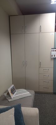 High-quality  3-door wardrobes with hinged doors. Cabinets with drawers or with shelves. Selection of handles, mezzanines.
