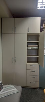 High-quality  3-door wardrobes with hinged doors. Cabinets with drawers or with shelves. Selection of handles, mezzanines.