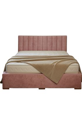 A bed with a headboard featuring vertical lines. A pink bed with a linen box and a mattress. Upholstered beds made in Latvia.