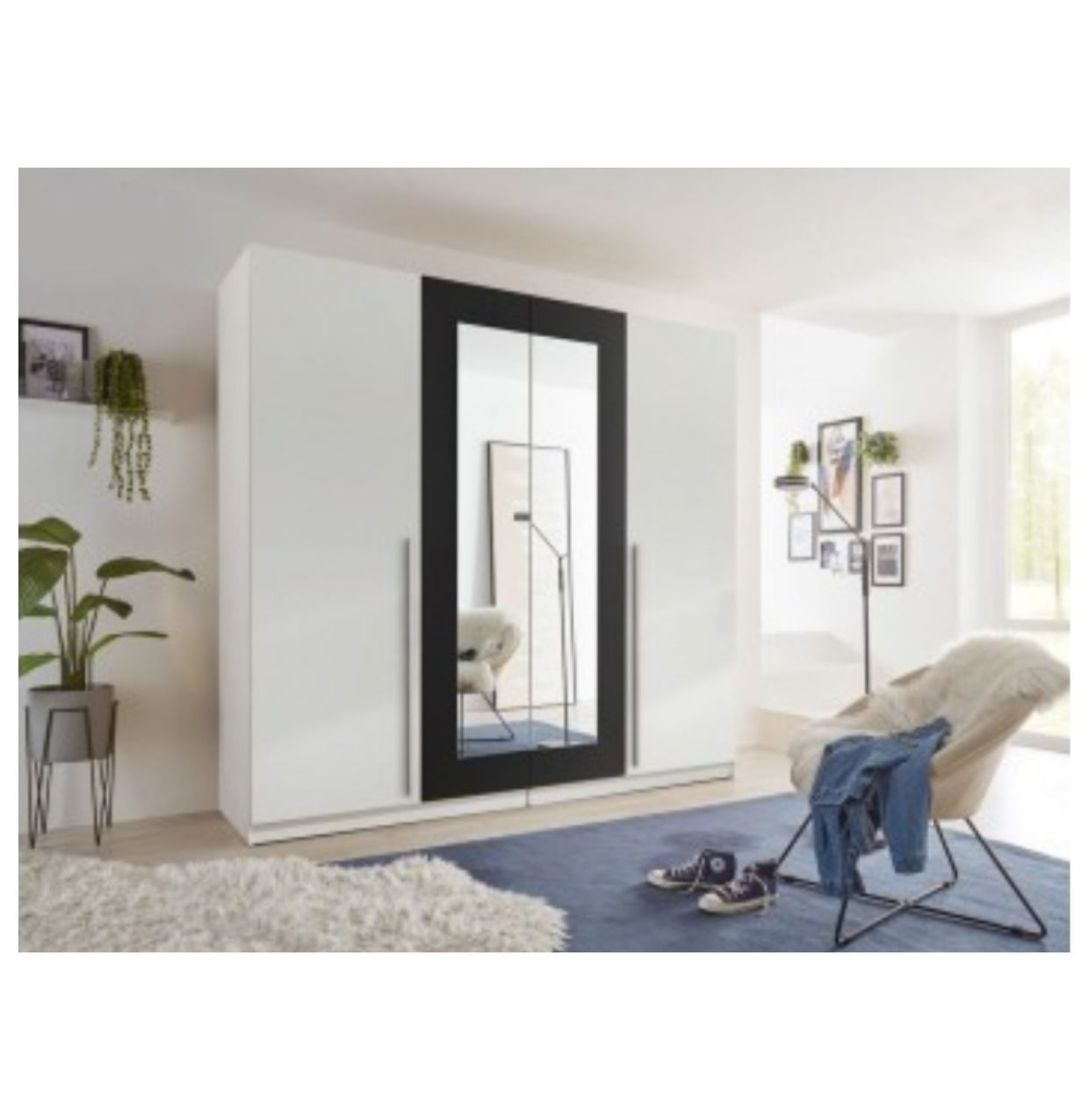 Spacious white wardrobe with a mirror, four-door wardrobes from Germany. Laminate wardrobe. Quality wardrobes in Jelgava. 