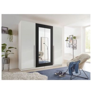 Spacious white wardrobe with a mirror, four-door wardrobes from Germany. Laminate wardrobe. Quality wardrobes in Jelgava. 