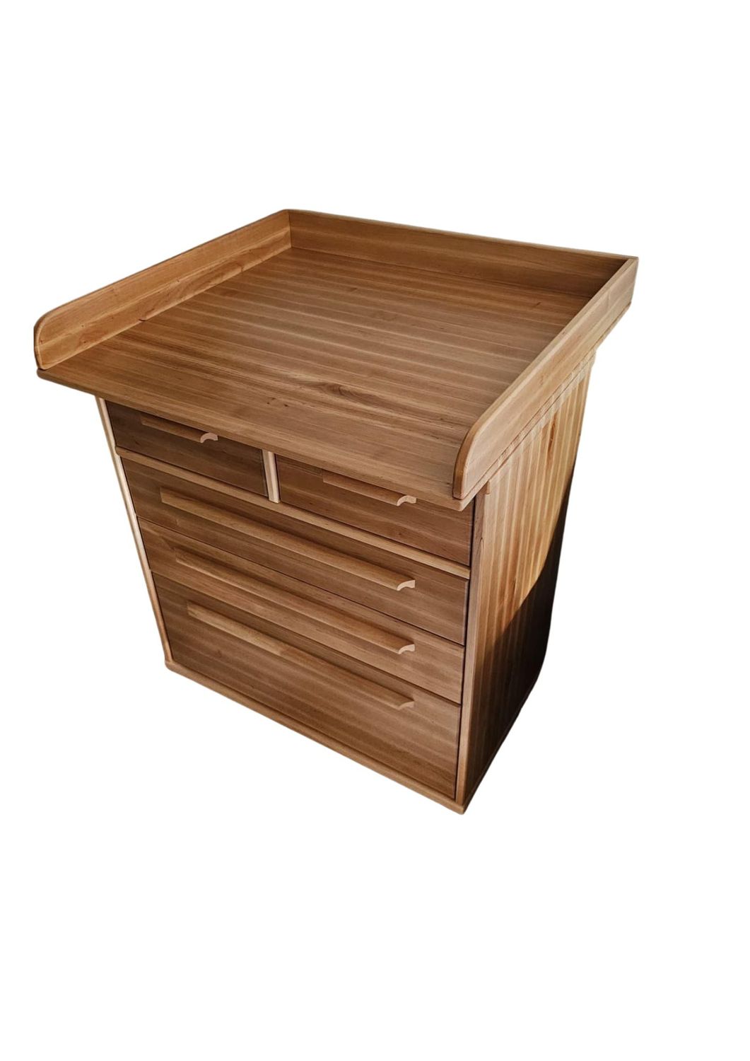 A changing table made of solid black alder.   Also available in white milk stain, walnut stain, and mahogany stain. Jelgava