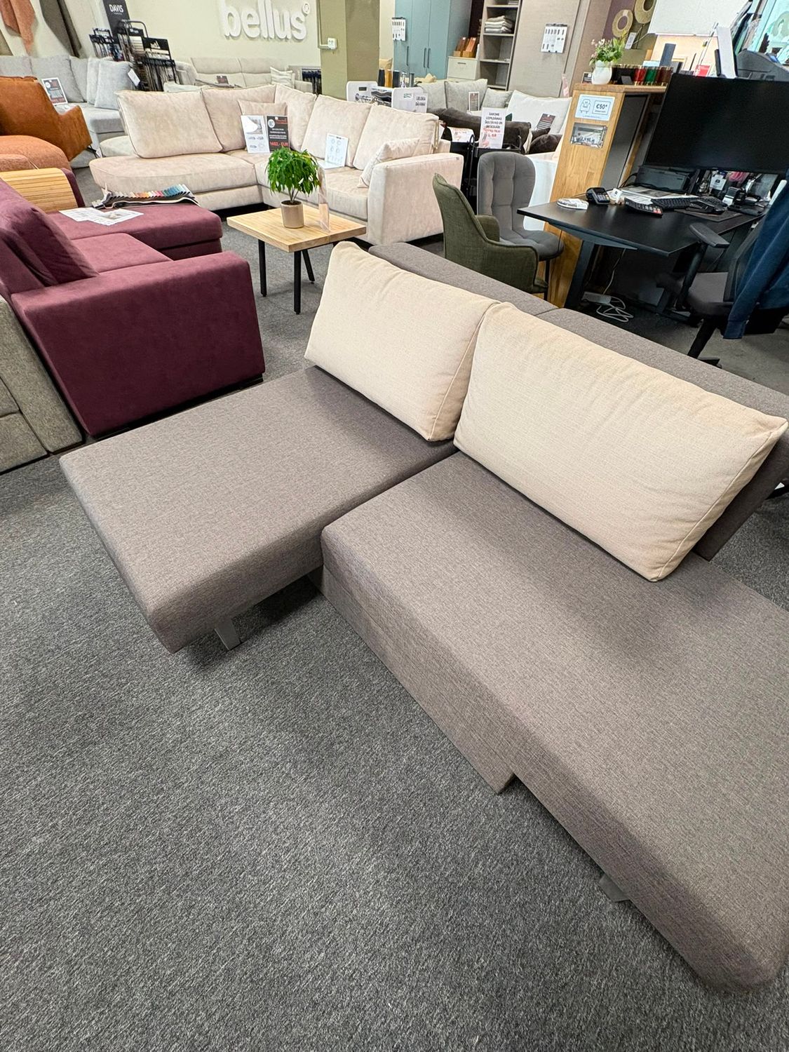 Transformer 2 extendable sofa display model with Bonell springs, storage compartment and spacious sleeping area.
