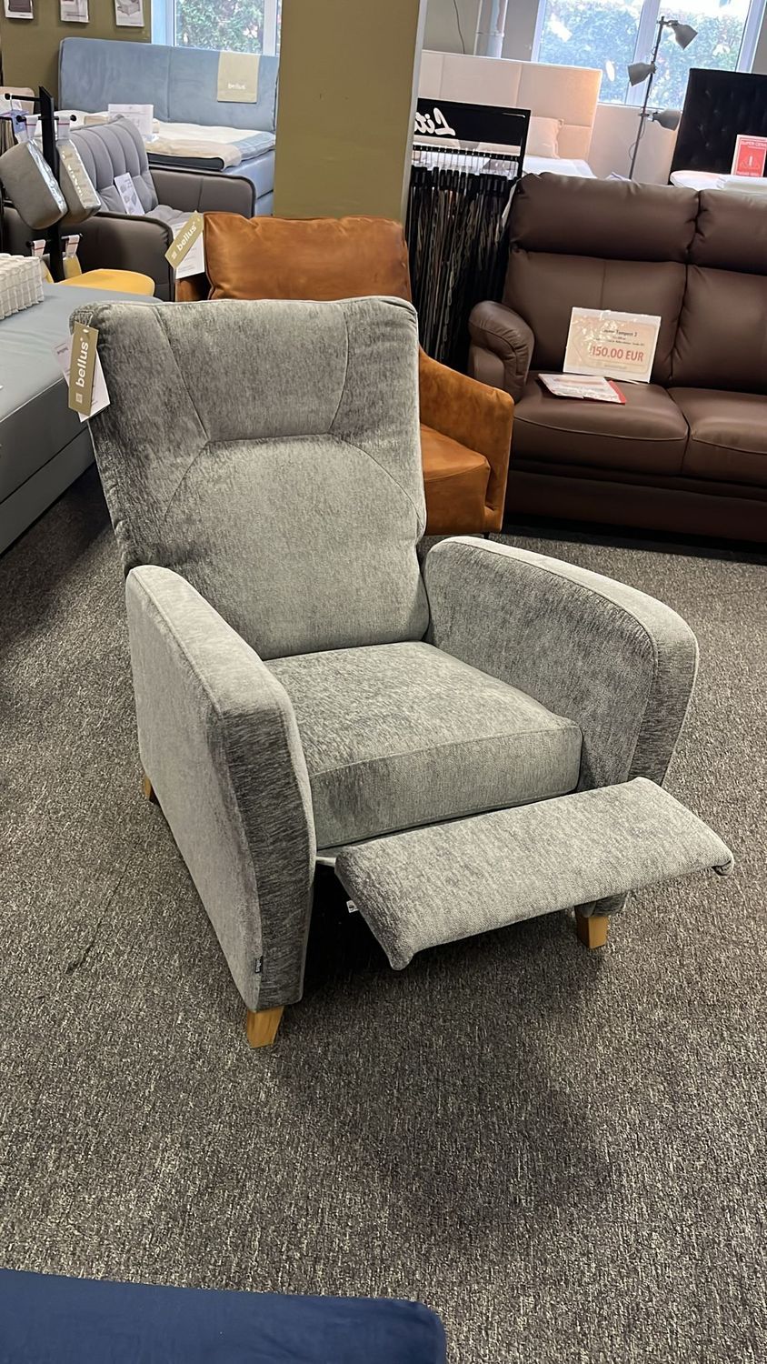 Tampa recliner chair with leg rest function by Bellus, available in various upholstery and wooden leg finishes.