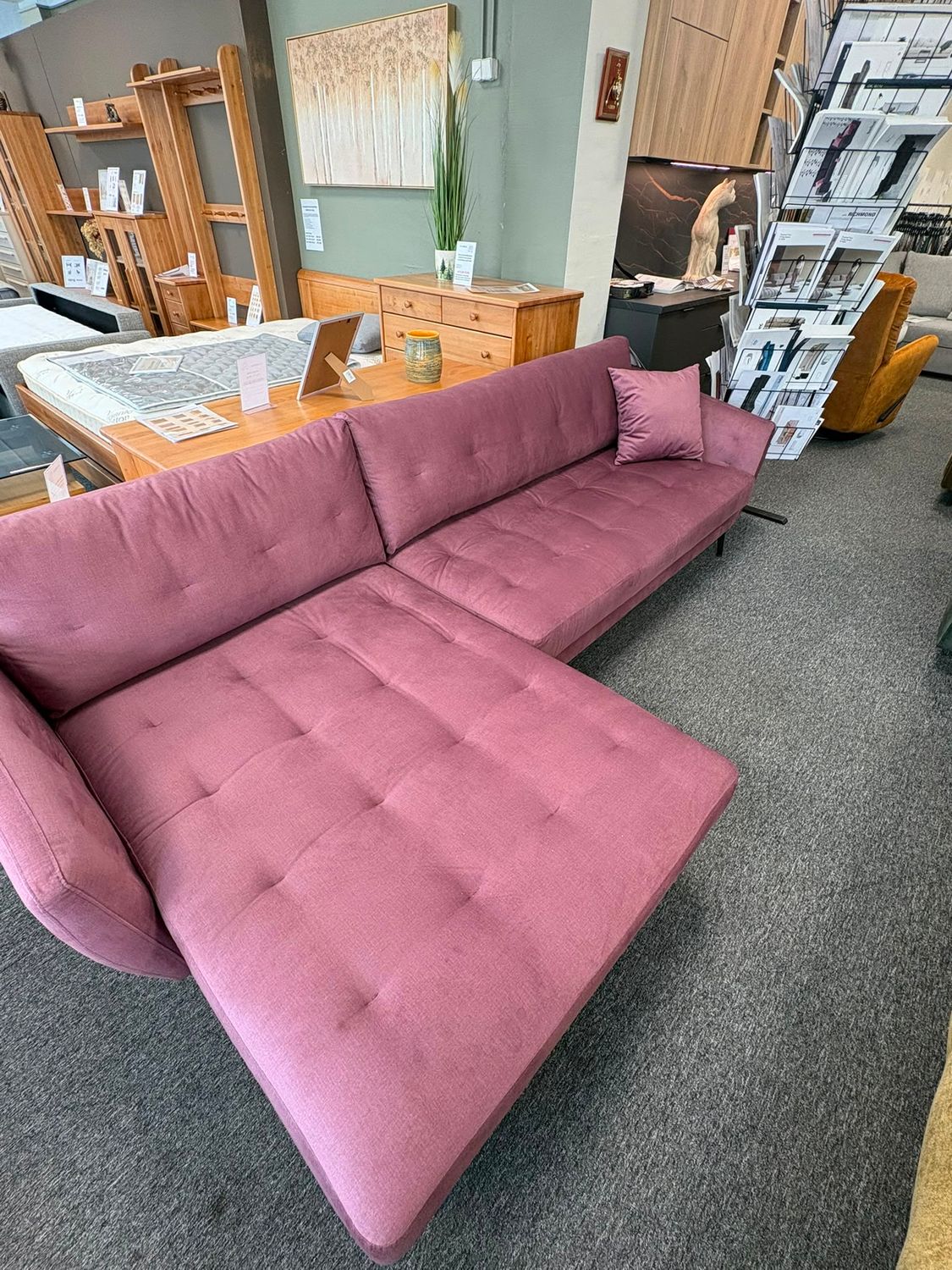 Modern Bellus Ego sofa or armchair with loose cushions and 17 cm high matte black metal legs.